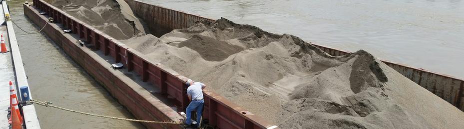 Barge filled with construction sand